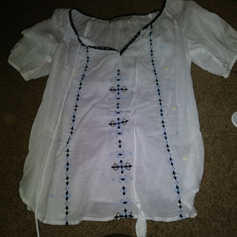 Embroidered blouse.